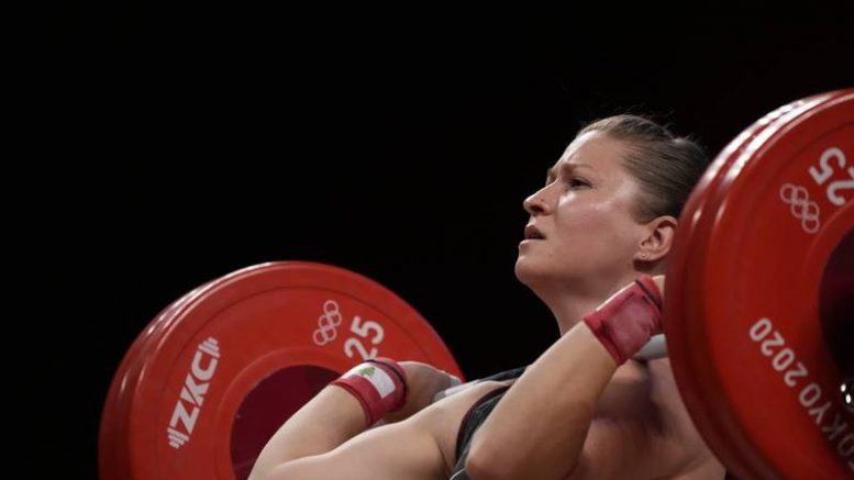 Mahassen Hala Fattouh of Lebanon competes in the women's 76kg weightlifting event.