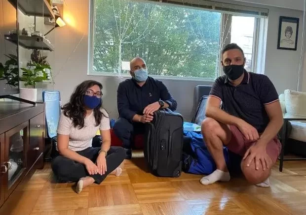 From left, Julnar Doueik, Charbel Elia and Patrick Rmeily will fly to Beirut later this week, carrying six suitcases filled with medications and essential supplies that have become near impossible to find in Lebanon. (Michelle Ghoussoub/CBC - image credit)